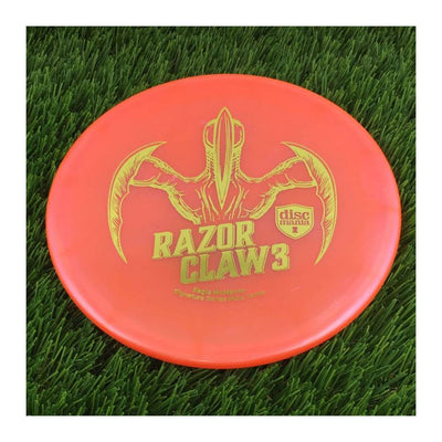 Discmania Evolution Meta Tactic with Razor Claw 3 - Eagle McMahon Signature Series Stamp - 176g - Translucent Orange