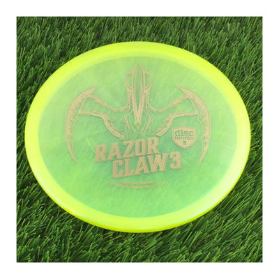 Discmania Evolution Meta Tactic with Razor Claw 3 - Eagle McMahon Signature Series Stamp - 173g - Translucent Yellow