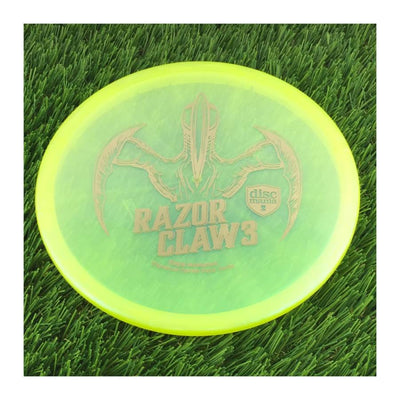 Discmania Evolution Meta Tactic with Razor Claw 3 - Eagle McMahon Signature Series Stamp - 173g - Translucent Yellow