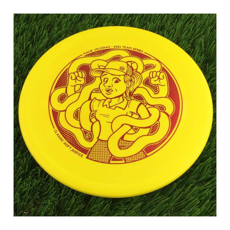 Dynamic Discs Classic Soft Justice with Macie Velediaz 2023 Team Series Stamp - 174g - Solid Yellow