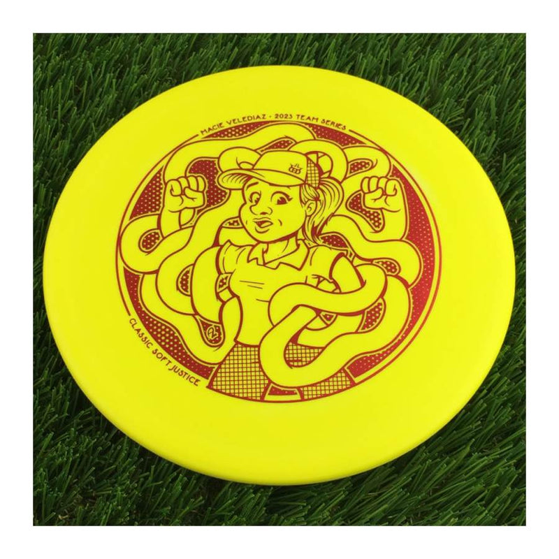 Dynamic Discs Classic Soft Justice with Macie Velediaz 2023 Team Series Stamp - 174g - Solid Yellow