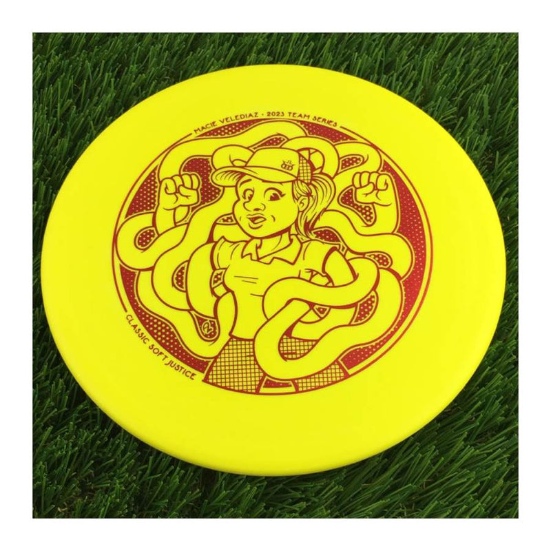 Dynamic Discs Classic Soft Justice with Macie Velediaz 2023 Team Series Stamp - 174g - Solid Yellow