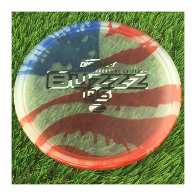 Discraft Elite Z Fly-Dyed BuzzzOS with 2023 Ledgestone Edition - Wave 2 Stamp - 180g - Translucent Flag