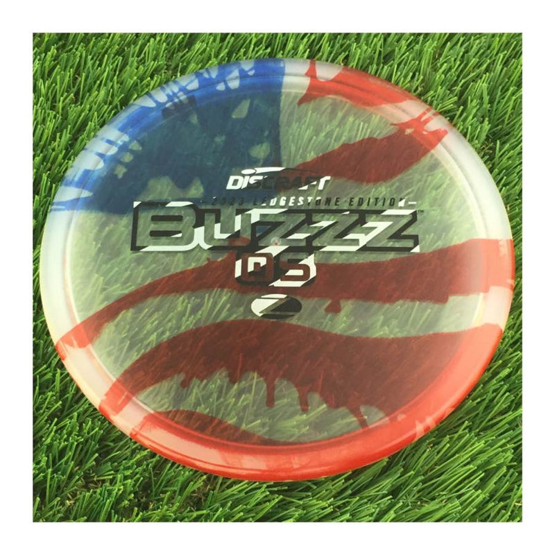 Discraft Elite Z Fly-Dyed BuzzzOS with 2023 Ledgestone Edition - Wave 2 Stamp - 180g - Translucent Flag