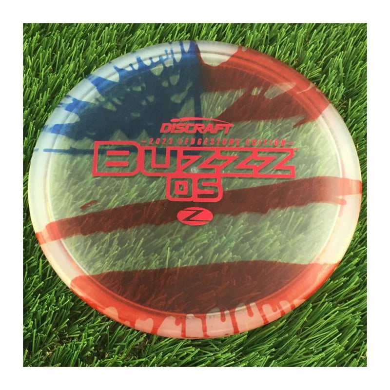 Discraft Elite Z Fly-Dyed BuzzzOS with 2023 Ledgestone Edition - Wave 2 Stamp - 180g - Translucent Flag