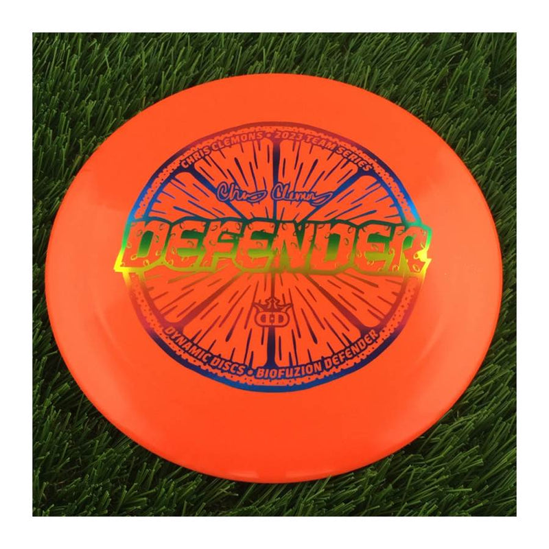 Dynamic Discs BioFuzion Defender with Chris Clemons Lemon Seeds Team Series 2023 Stamp - 173g - Solid Orange