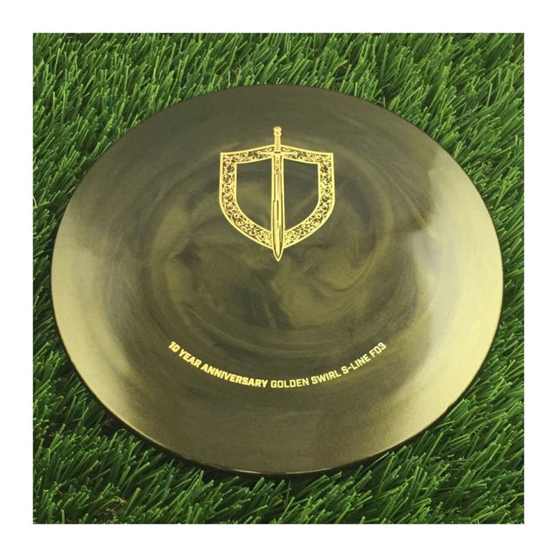 Discmania Golden Swirl S-Line FD3 with 10 Year Anniversary Sword and Shield Stamp - 175g - Solid Gold