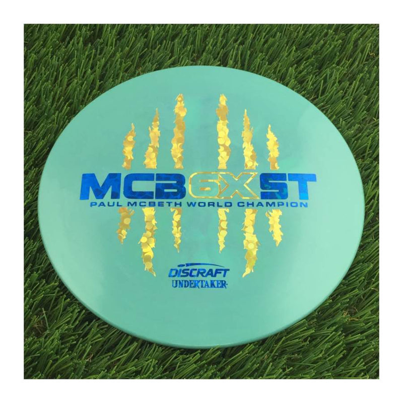 Discraft ESP Swirl Undertaker with McBeast 6X Claw PM World Champ Stamp - 173g - Solid Blue