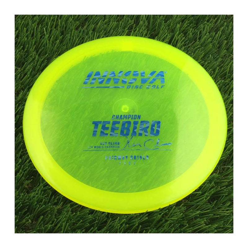 Innova Champion Teebird with Ken Climo 12x World Champion Burst Logo Stamp - 175g - Translucent Yellow