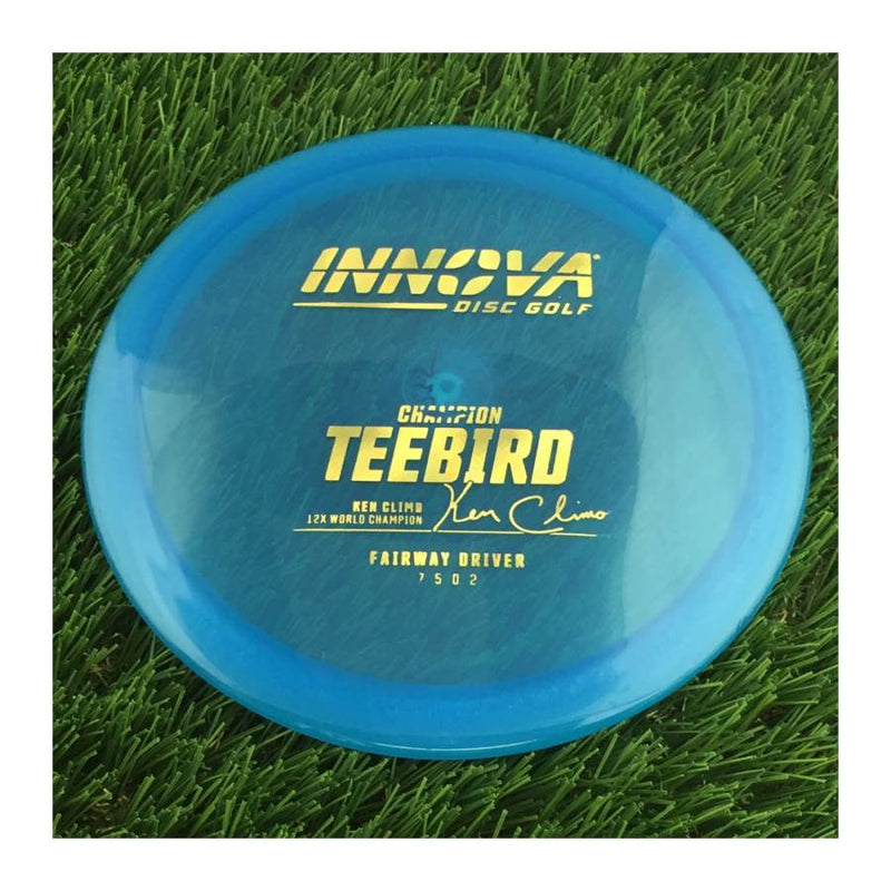 Innova Champion Teebird with Ken Climo 12x World Champion Burst Logo Stamp - 175g - Translucent Blue