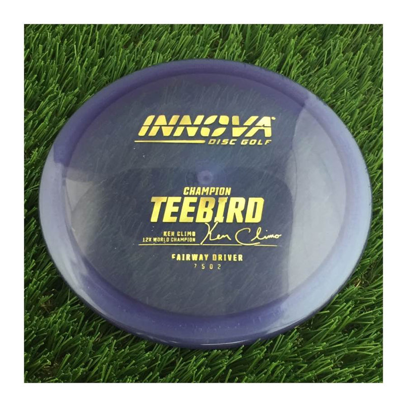 Innova Champion Teebird with Ken Climo 12x World Champion Burst Logo Stamp - 175g - Translucent Purple