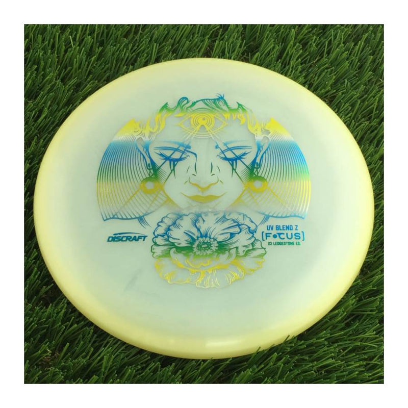 Discraft Elite Z UV Focus with 2023 Ledgestone Edition - Wave 3 Stamp - 174g - Translucent Cream