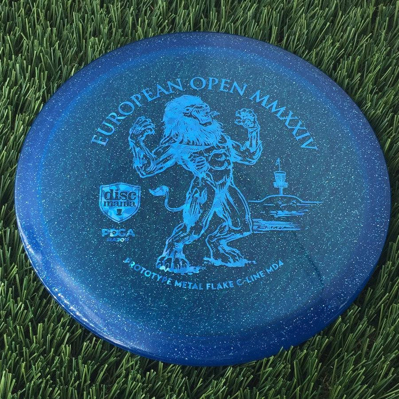 Discmania Italian C-Line Metal Flake MD4 with European Open MMXXIV | PDGA Major | EO2024 Fundraiser Prototype Stamp - 178g - Translucent Blue