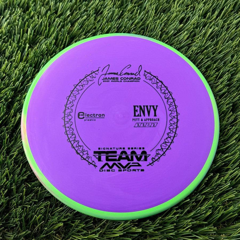 Axiom Electron Medium Envy with James Conrad Signature Series Stamp - 171g Purple