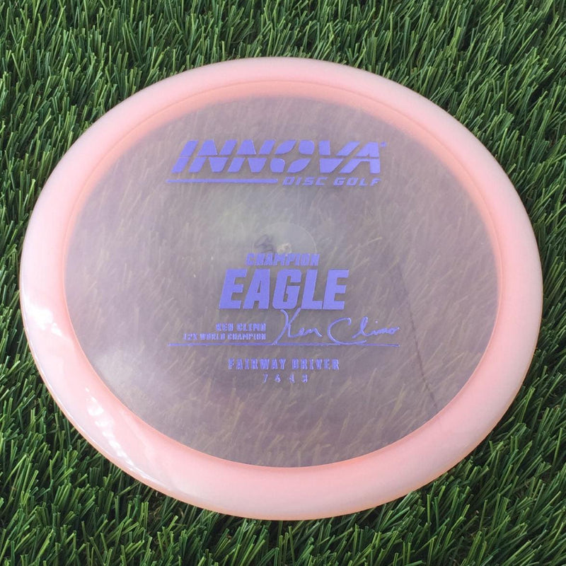 Innova Champion Eagle with Ken Climo 12 Time World Champion Burst Logo Stamp - 175g - Translucent Pink