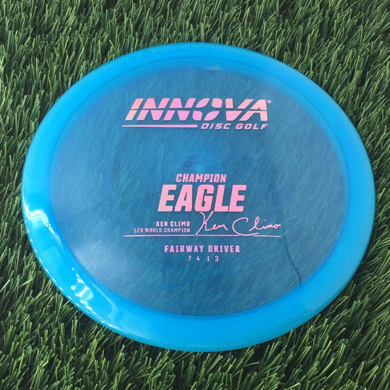 Innova Champion Eagle with Ken Climo 12 Time World Champion Burst Logo Stamp - 166g - Translucent Blue