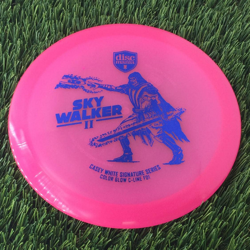 Discmania C-Line Color Glow Reinvented FD1 with Casey White Signature Series 2024 - Sky Walker II Stamp - 171g - Translucent Pink