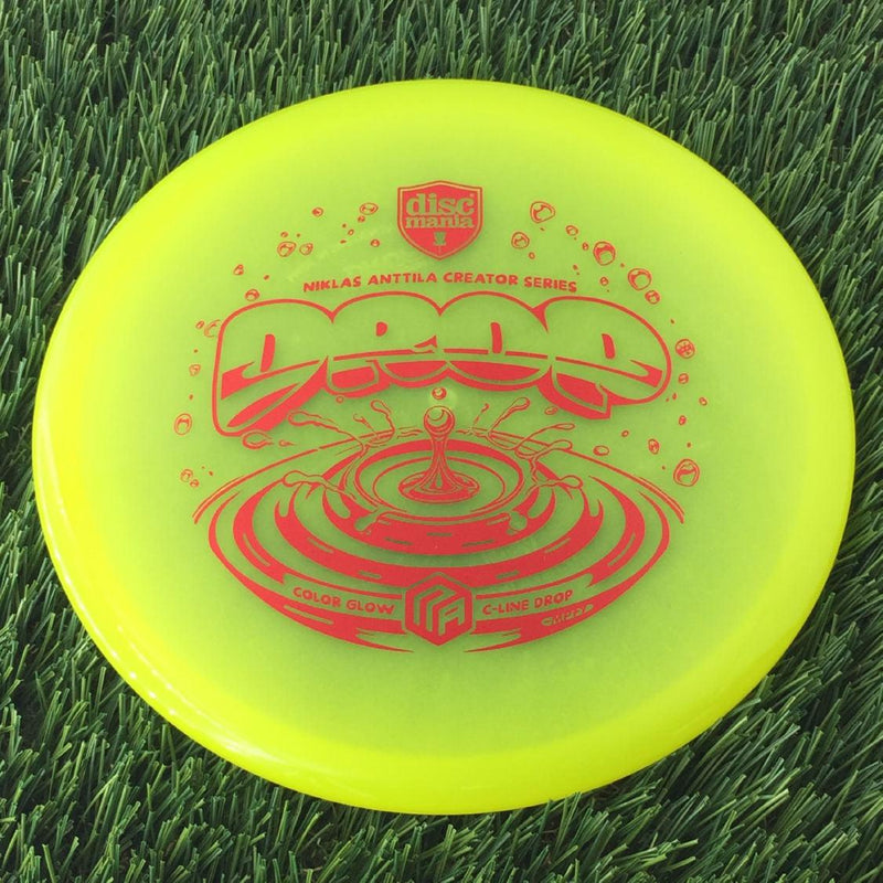 Discmania C-Line Color Glow Reinvented Drop with Niklas Anttila Creator Series - NA Logo - Water Drop Stamp - 173g - Translucent Yellow