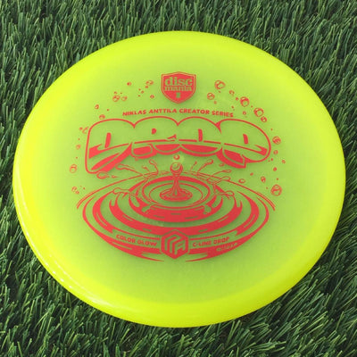 Discmania C-Line Color Glow Reinvented Drop with Niklas Anttila Creator Series - NA Logo - Water Drop Stamp - 174g - Translucent Yellow