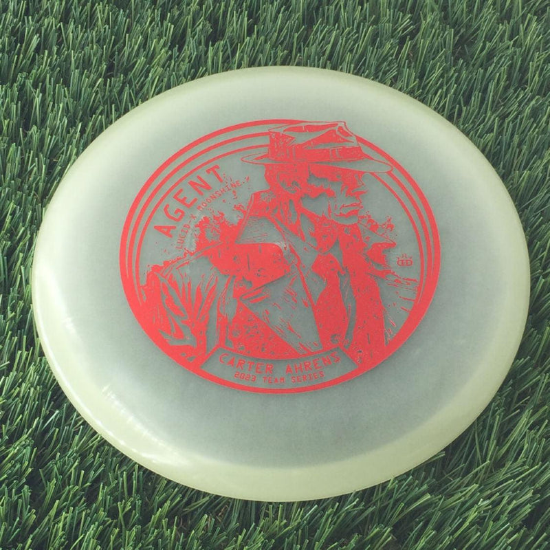 Dynamic Discs Lucid-X Moonshine Glow Agent with Carter Ahrens Secret Agent Team Series 2023 Stamp - 175g - Translucent Glow