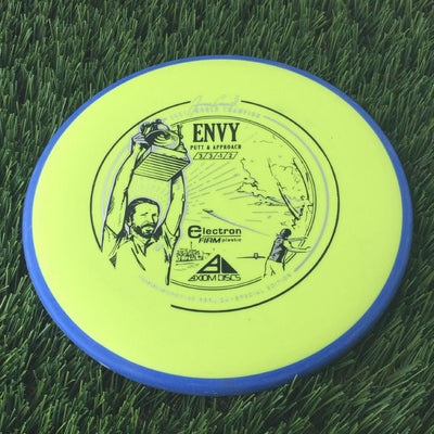 Axiom Electron Firm Envy with James Conrad 2021 World Champion Commemorative Replica Special Edition - Art by Mike Inscho Stamp - 172g Yellow