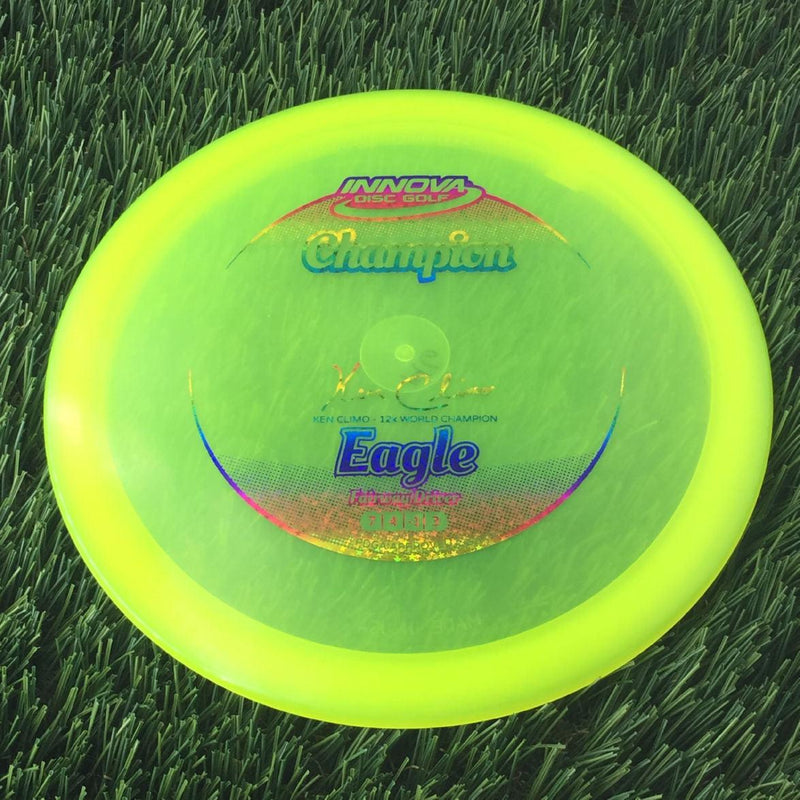 Innova Champion Eagle with Ken Climo - 12x World Champion New Stamp Stamp - 146g - Translucent Yellow