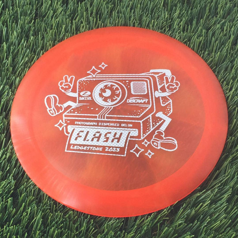 Discraft Elite Z Swirl Flash with 2023 Ledgestone Edition - Wave 1 Stamp - 174g - Translucent Red