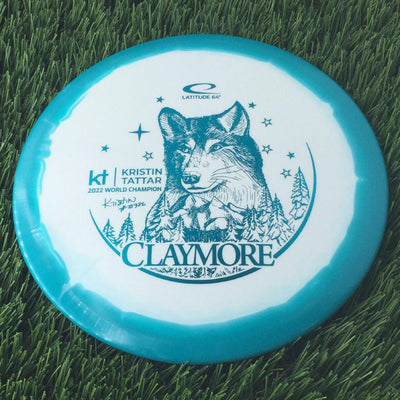 Latitude 64 Gold Line Orbit Claymore with Kristin Tattar #73986 - 2022 World Champion Team Series 2023 Stamp - 178g Green