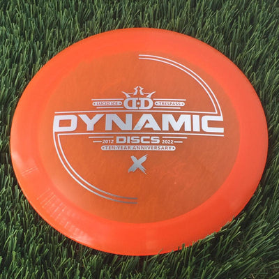 Dynamic Discs Lucid Ice Trespass with Ten-Year Anniversary 2012-2022 Stamp - 173g - Translucent Orange