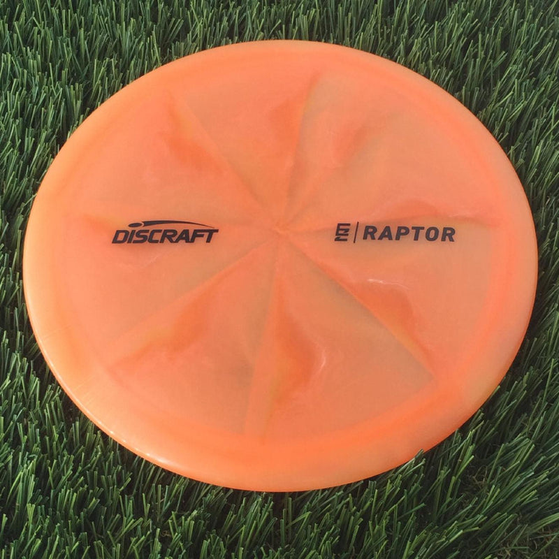 Discraft Elite Z Swirl Raptor with Ezra Aderhold - EZ Small Logo Stamp - 174g - Translucent Orange