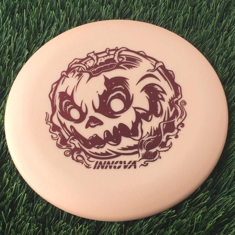 Innova Nexus Color Glow Aviar Putter with Doom Pumpkin - Innova Halloween 2024 Stamp - 167g Muted Orange