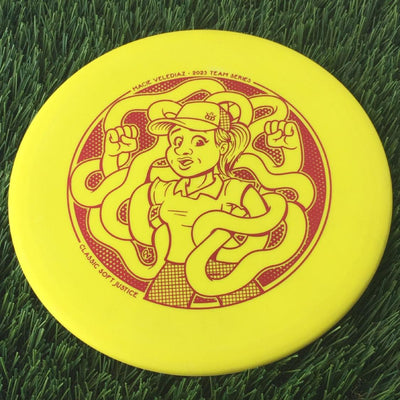 Dynamic Discs Classic Soft Justice with Macie Velediaz 2023 Team Series Stamp - 173g - Solid Yellow