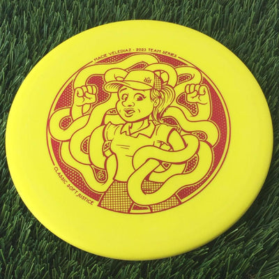 Dynamic Discs Classic Soft Justice with Macie Velediaz 2023 Team Series Stamp - 173g - Solid Yellow