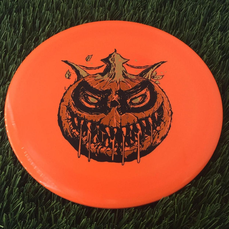 Dynamic Discs BioFuzion EMAC Truth with Scary Pumpkin with DD Crown - Triple Foil 2024 Stamp - 177g Orange