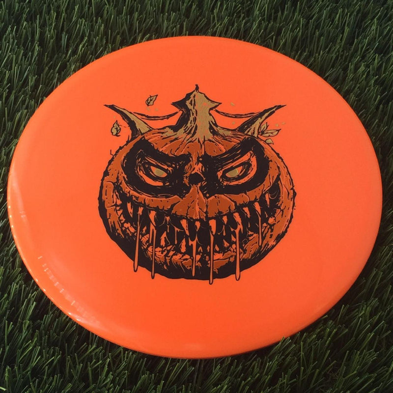 Dynamic Discs BioFuzion EMAC Truth with Scary Pumpkin with DD Crown - Triple Foil 2024 Stamp - 177g Orange