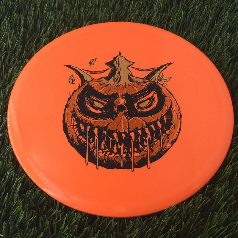 Dynamic Discs BioFuzion EMAC Truth with Scary Pumpkin with DD Crown - Triple Foil 2024 Stamp - 177g Orange