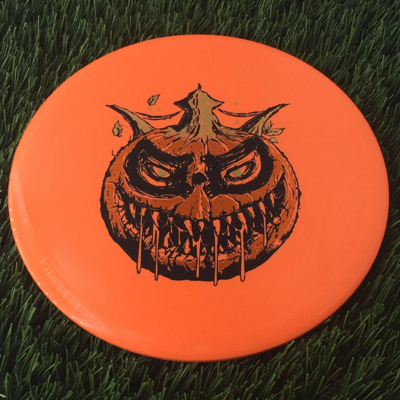 Dynamic Discs BioFuzion EMAC Truth with Scary Pumpkin with DD Crown - Triple Foil 2024 Stamp - 177g Orange