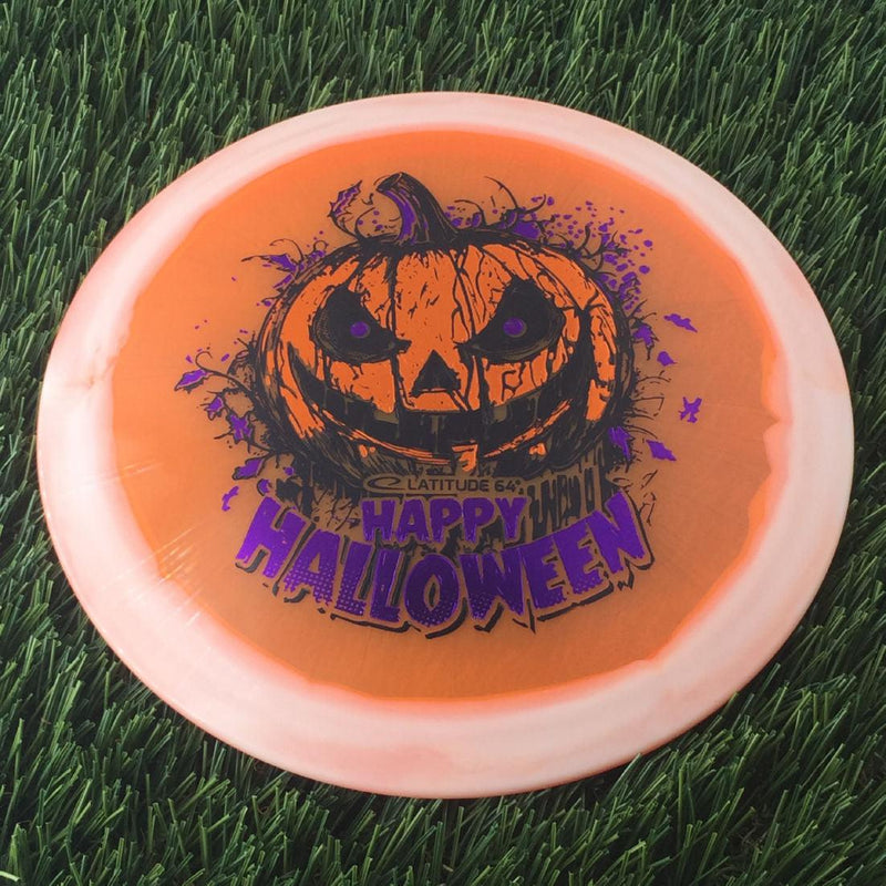 Latitude 64 Opto Ice Orbit Saint Pro with Happy Halloween Spooky Pumpkin - Triple Foil 2024 Stamp - 176g - Translucent Orange