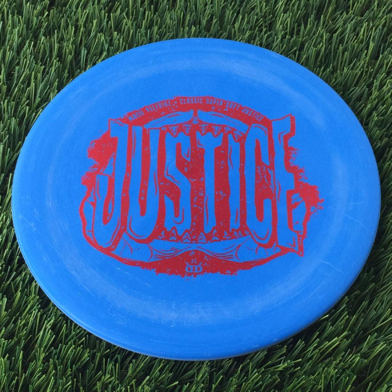 Dynamic Discs Classic Super Soft Justice with Macie Velediaz Shark Jaw Team Series 2023 Stamp - 173g Light Blue