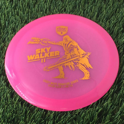 Discmania C-Line Color Glow Reinvented FD1 with Casey White Signature Series 2024 - Sky Walker II Stamp - 173g - Translucent Pink