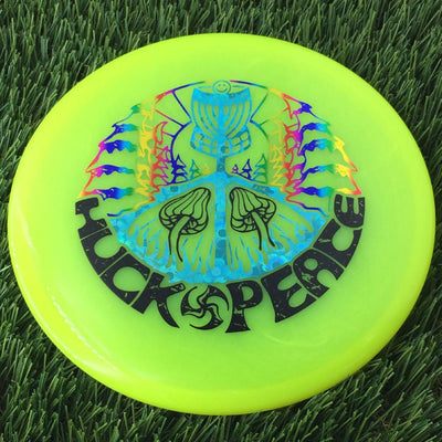 Discmania Soft Neo Spore with Huck Peace - Small TriFly in the Forest - Triple Foil Stamp - 159g - Translucent Yellow