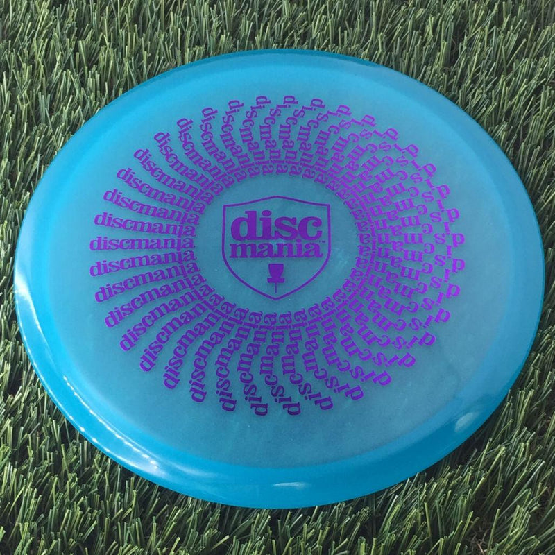 Discmania C-Line Color Glow MD1 Reinvented with Discmania Shield and Spiral Phenakistoscope Stamp - 177g - Translucent Blue