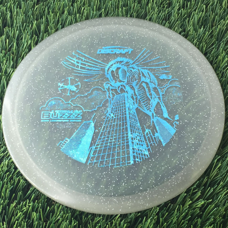 Discraft Elite Z Sparkle Glow Buzzz with 2023 Ledgestone Edition - Wave 1 Stamp - 180g - Translucent Grey