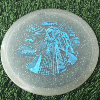 Discraft Elite Z Sparkle Glow Buzzz with 2023 Ledgestone Edition - Wave 1 Stamp - 180g - Translucent Grey