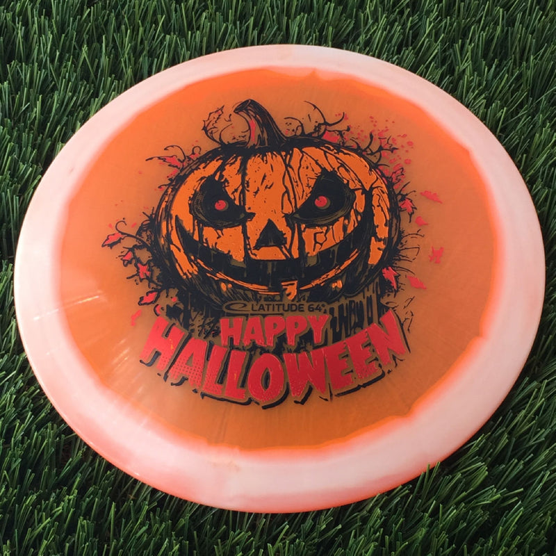 Latitude 64 Opto Ice Orbit Saint Pro with Happy Halloween Spooky Pumpkin - Triple Foil 2024 Stamp - 176g - Translucent Orange