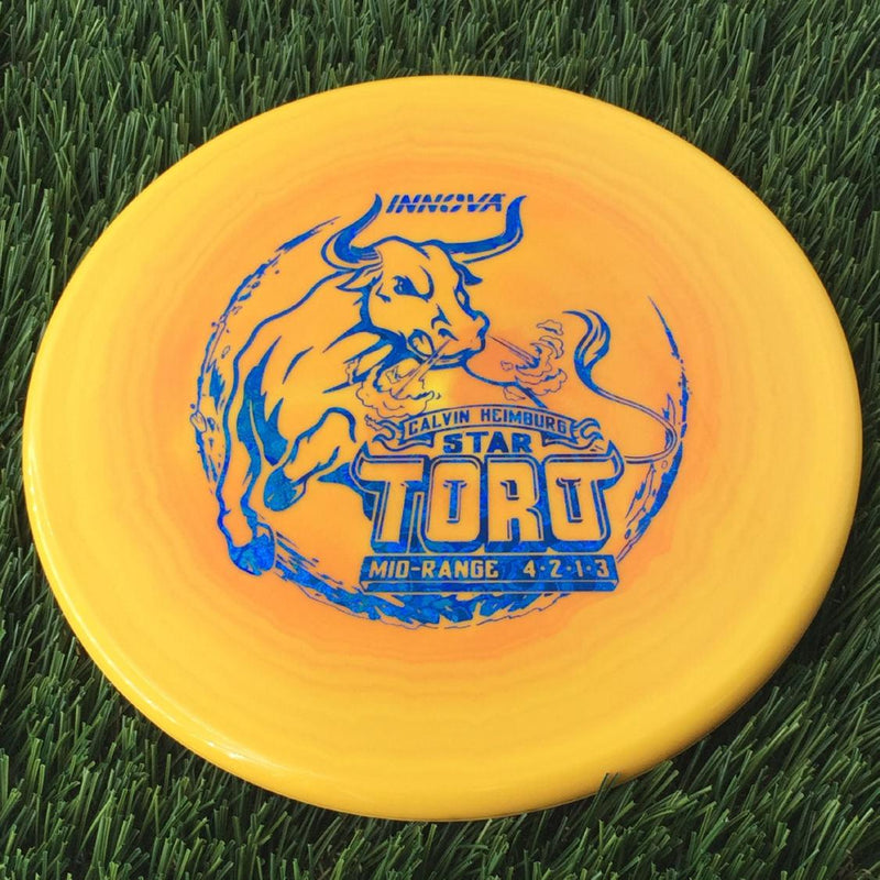 Innova Star Toro with Calvin Heimburg Signature Series Stamp - 175g Light Orange