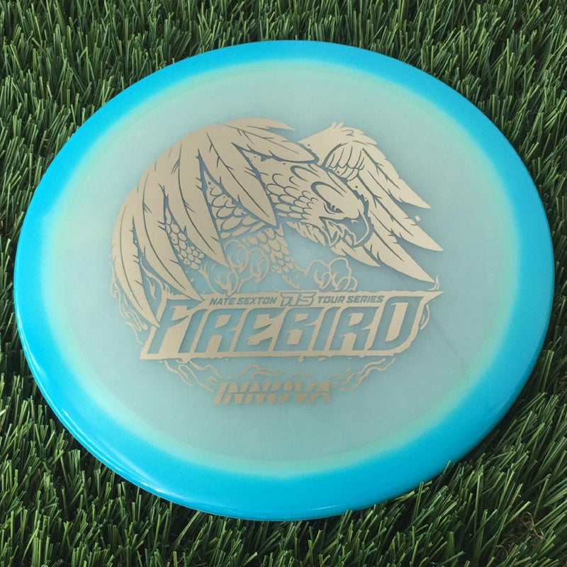 Innova Proto Glow Halo Champion Firebird with Nate Sexton 2024 Tour Series Stamp - 175g - Translucent Turquoise Blue