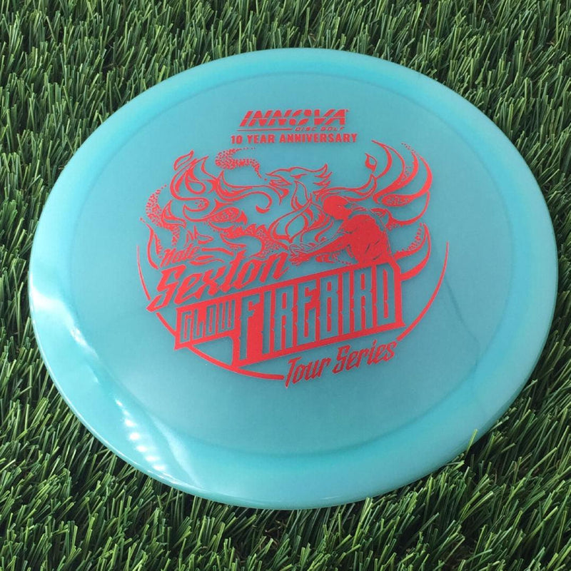 Innova Proto Color Glow Champion Firebird with Nate Sexton "Sexybird" 10 Year Anniversary Tour Series Stamp - 175g - Translucent Bluish Green