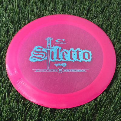 Latitude 64 Opto-X Stiletto with 10 Year Anniversary Sword Stamp - 173g - Translucent Pink