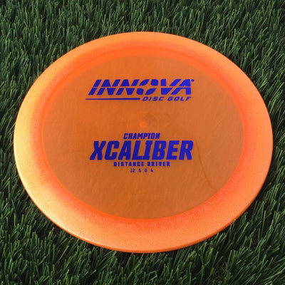 Innova Champion Xcaliber with Burst Logo Stock Stamp - 162g - Translucent Orange